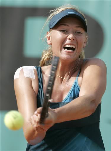 Players assessing a tennis game