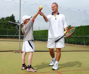 https://tennisinstruction.com/wp-content/uploads/2021/01/tennis-coaching-for-kids.jpg